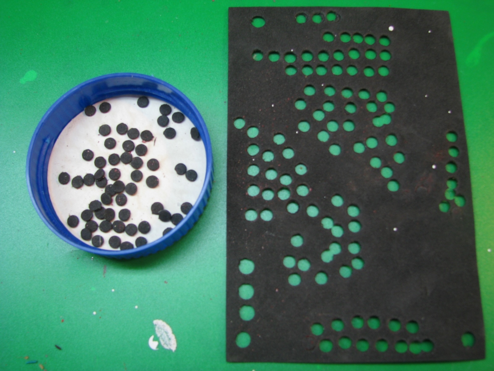 50 pucks made from foam, made with hole punch