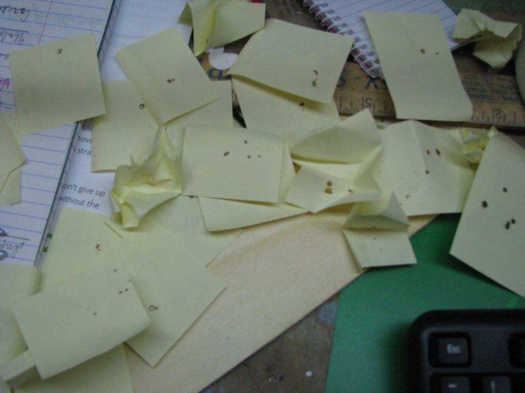 Pile of post it notes used in one session.  Very difficult to do alignment.