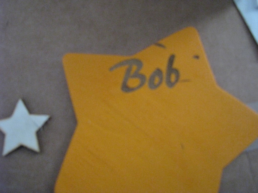 Wood star, painted yellow